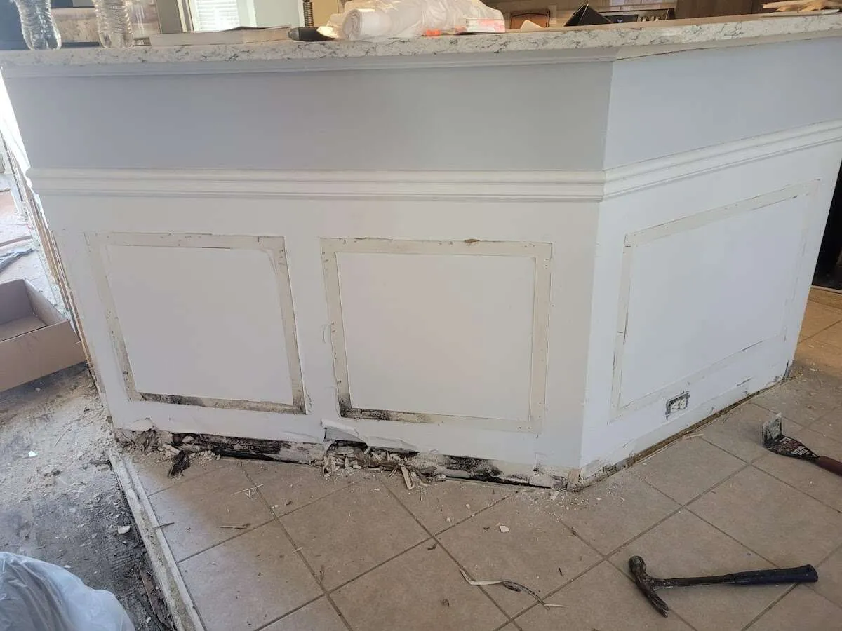 Water damage and mold on kitchen during Storm Damage Restoration in Lake Holiday